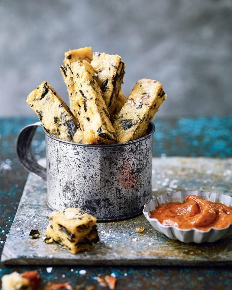 Polenta and chard chips with rich tomato sauce recipe | delicious. magazine