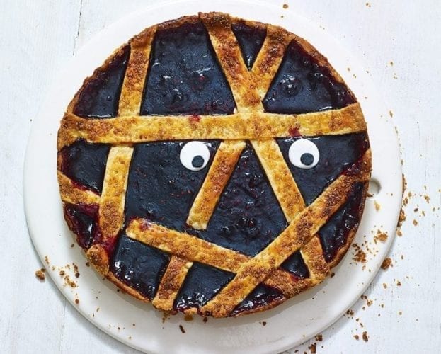 Spooky mummy blackberry jam tart