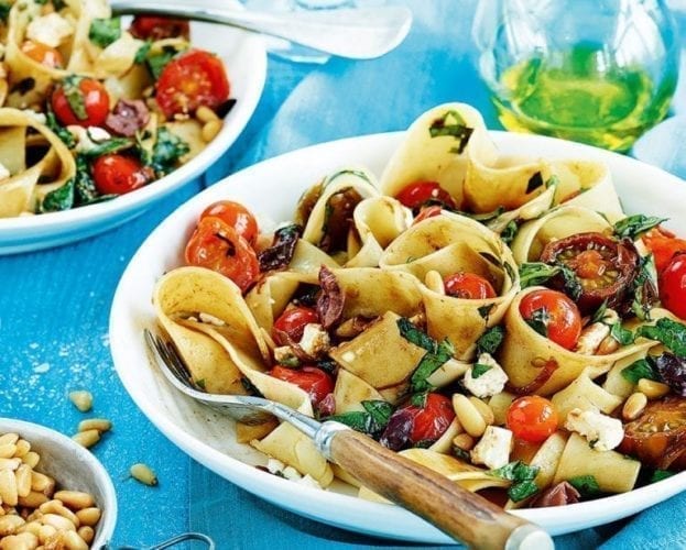 Tomato, feta and olive pasta pappardelle on a plate