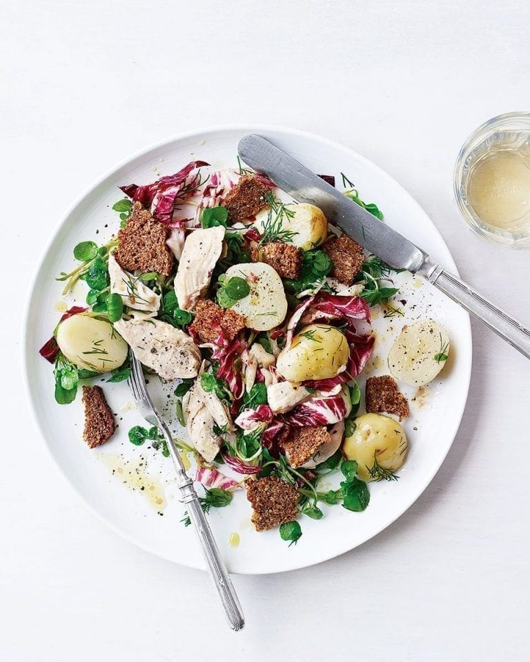 Chicken, dill and potato salad with anchovy dressing and rye bread croutons