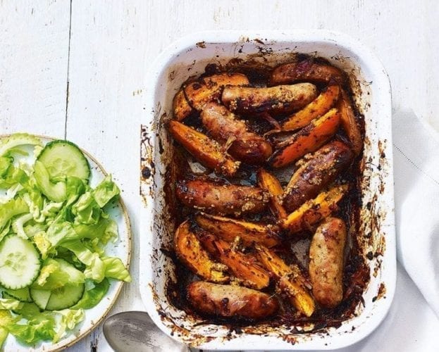 Sausages and potatoes in ale with roasted red onions