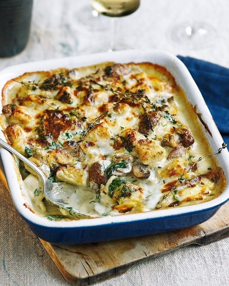 Baked gnocchi with cream, mushrooms and blue cheese sauce