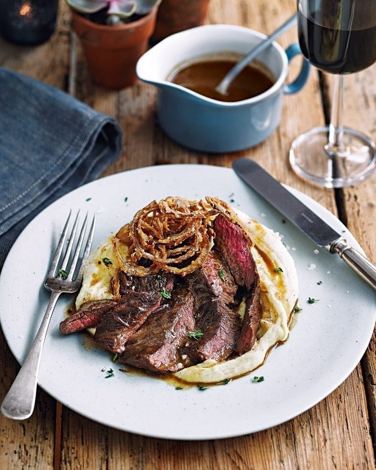Glazed onglet steak with brown butter mash, crispy shallots and madeira