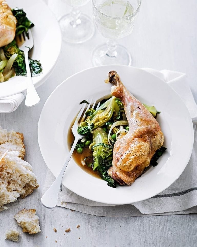 Roast chicken legs with braised little gems, peas and mint