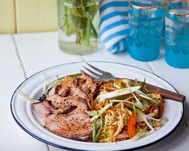 Butterflied marinated leg of lamb with couscous salad and harissa yogurt
