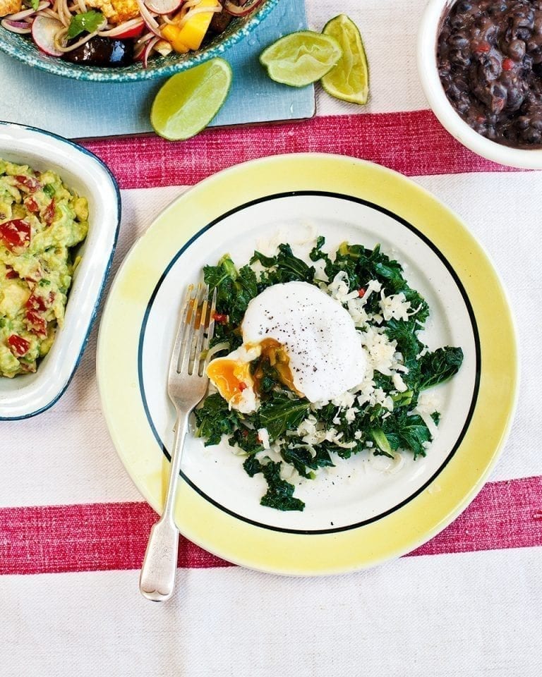 Fried kale with black bean chilli and guacamole