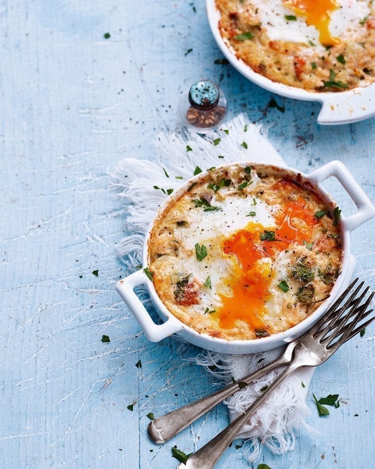 Baked eggs with hot-smoked salmon and herbs