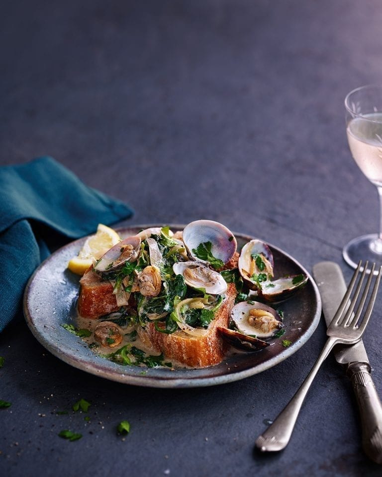 Lemon, parsley and spinach clams on toast