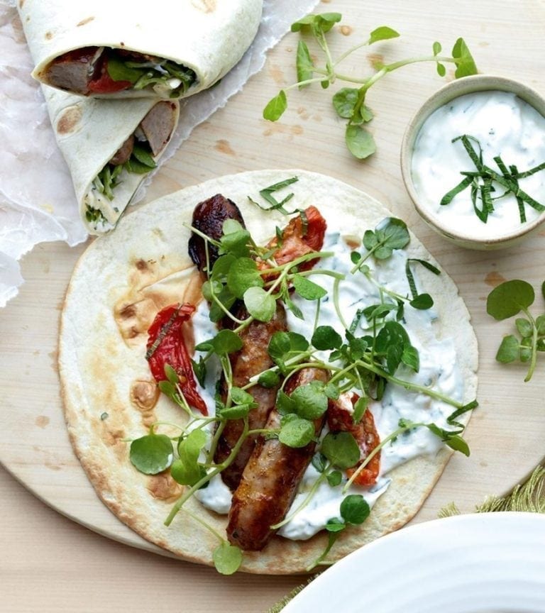 Watercress, sun-blush tomato and sausage wraps