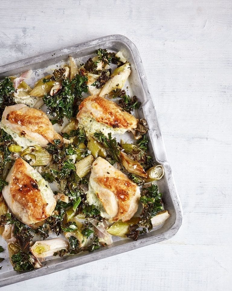 One-tray roast chicken with pesto stuffing and greens