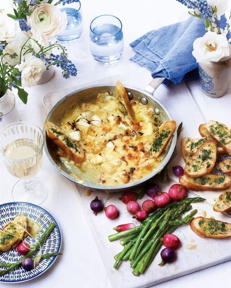 Sharing pan fondue with garlic toasts, roasted radishes and asparagus