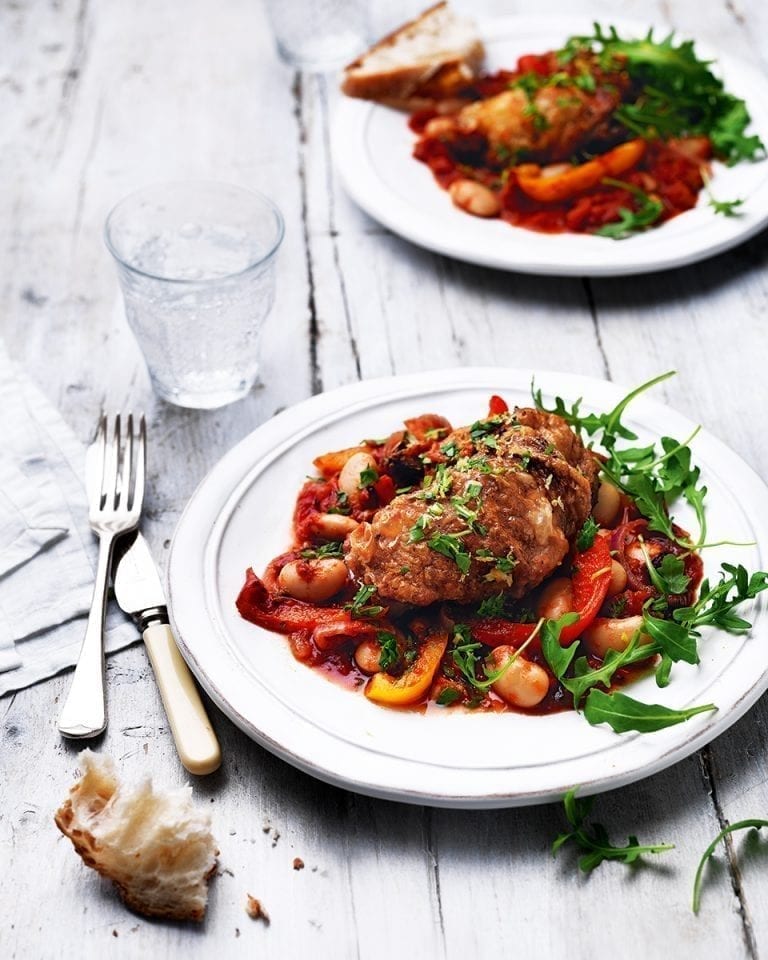 Baked chicken thighs with peppers and butter beans