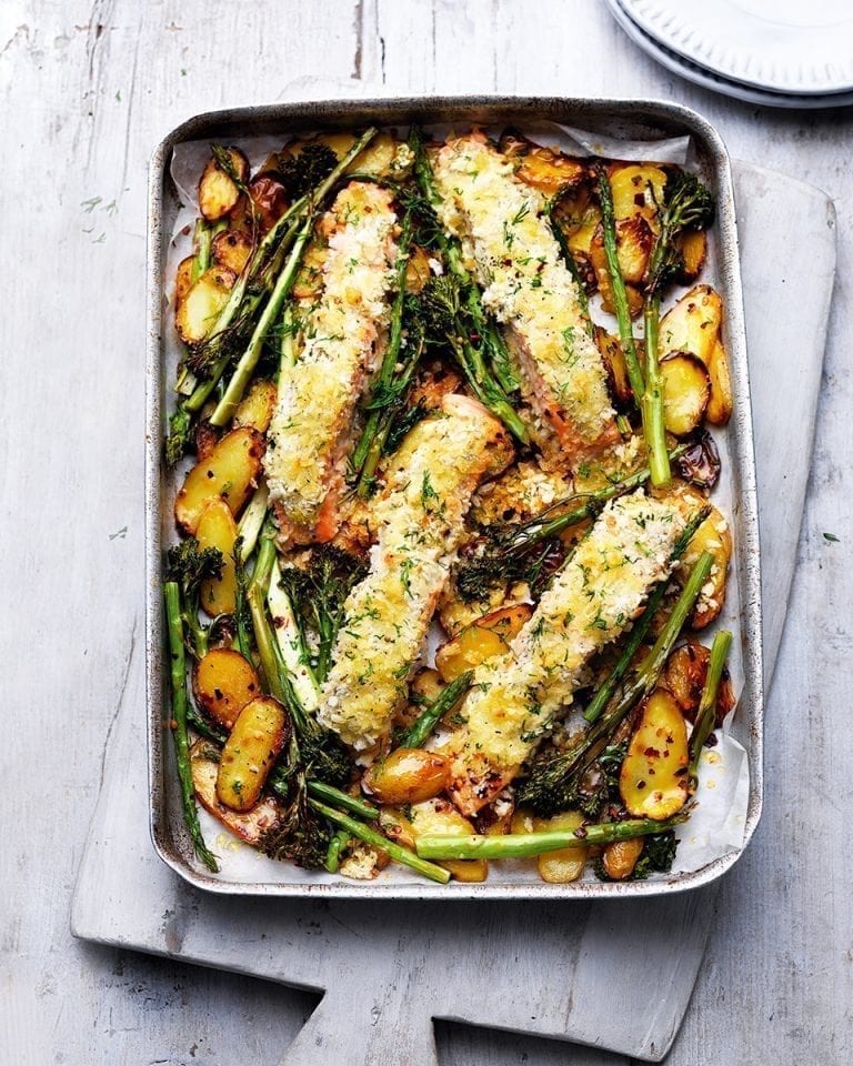 Tray-roast salmon and vegetables with crème fraîche and crumbs