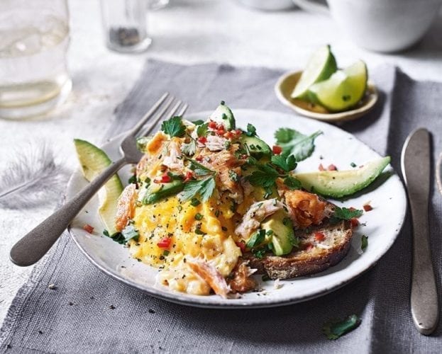 Scrambled eggs with avocado and a salmon salsa