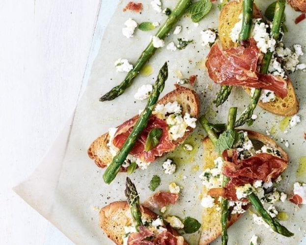 Grilled asparagus and parma ham on toast