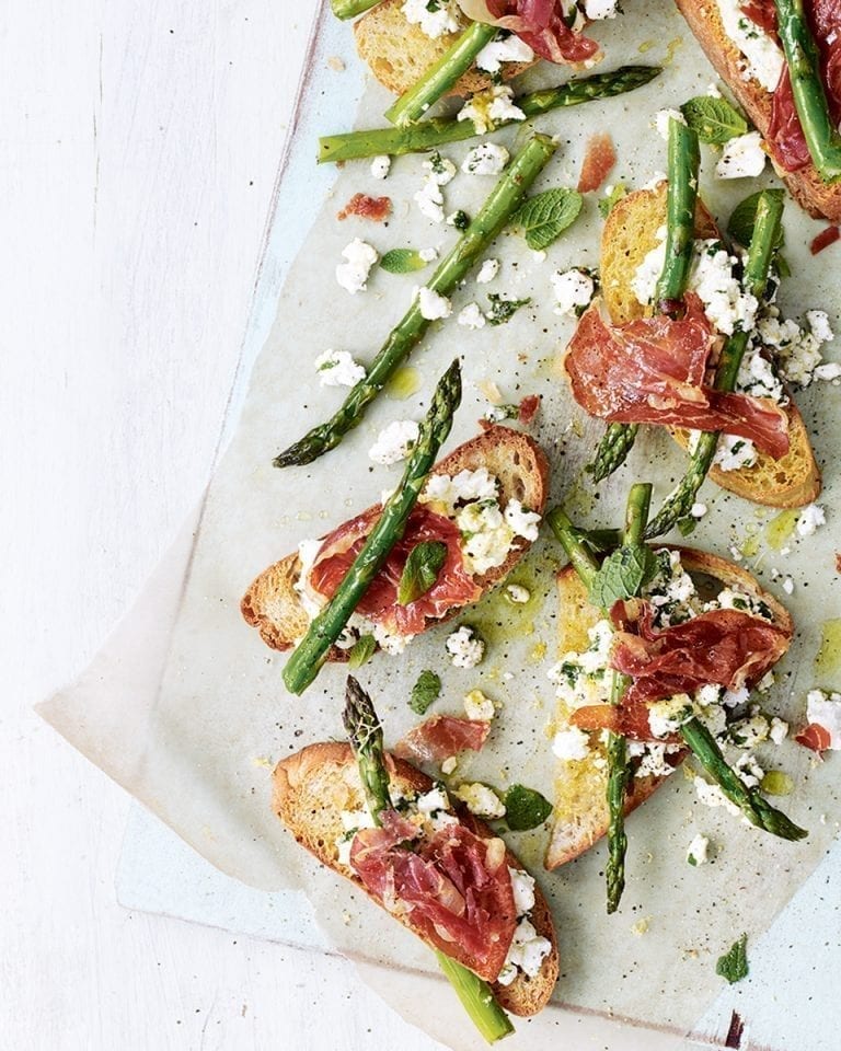 Grilled asparagus and parma ham on toast