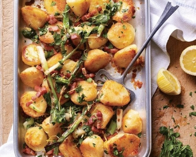 Golden roasties with bacon, spring onions, lemon and parsley
