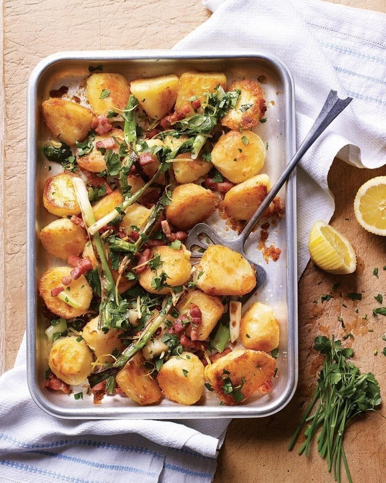 Golden roasties with bacon, spring onions, lemon and parsley