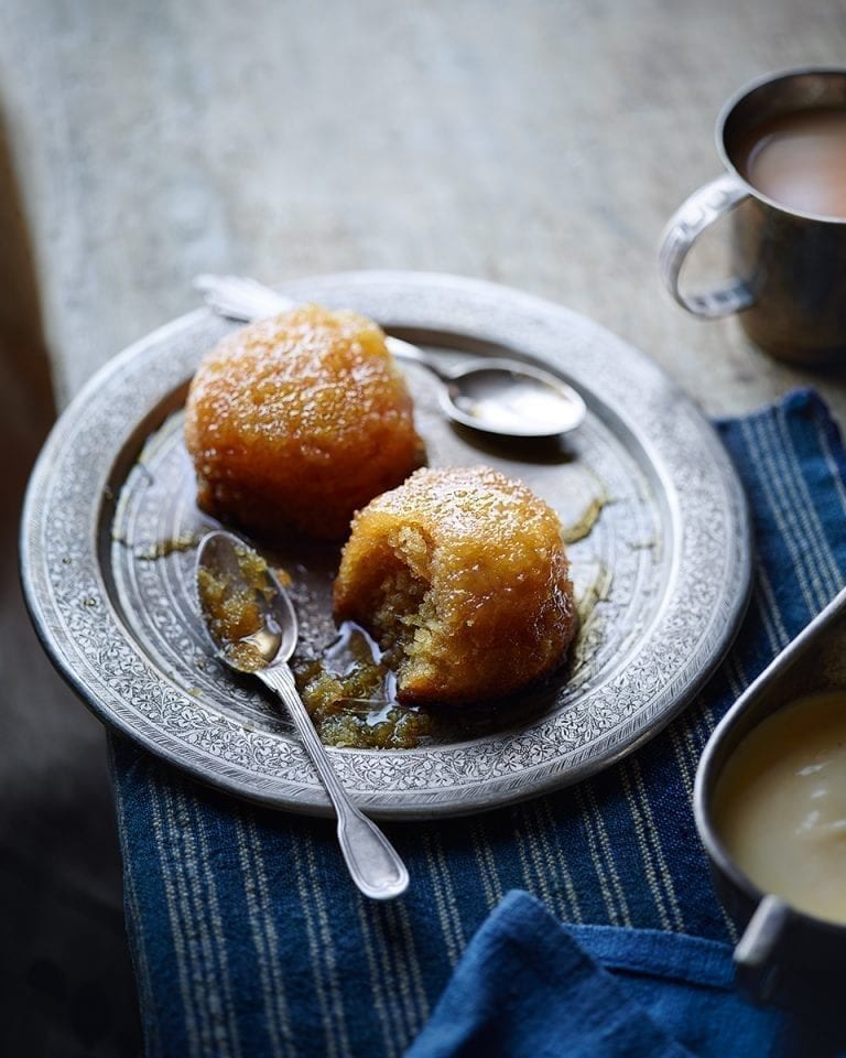 Baked lemon curd syrup sponges with brandy custard