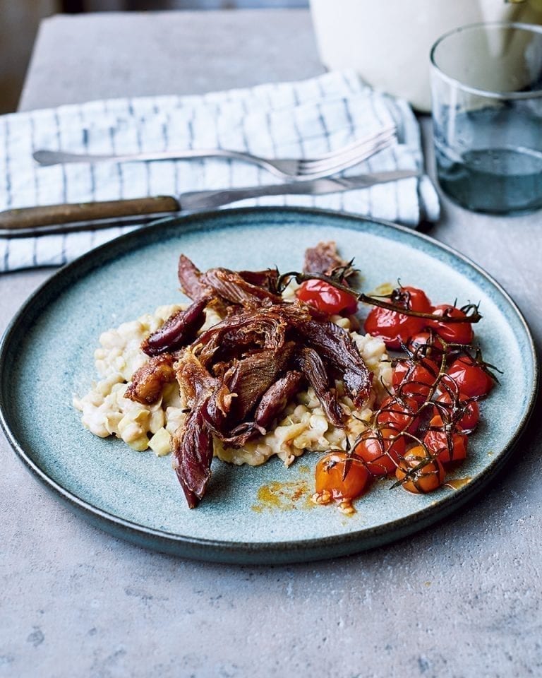 Crispy lamb with lemony flageolet beans and roast tomatoes