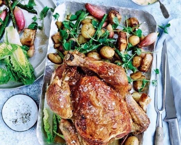 Roast chicken with crispy potatoes, summer salad and herby hollandaise