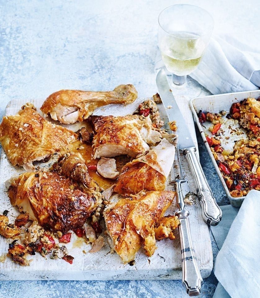 Roast chicken with sausage stuffing recipe delicious. magazine