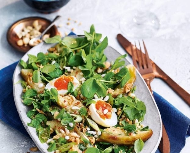 Spicy aubergine salad with peanuts, herbs and egg