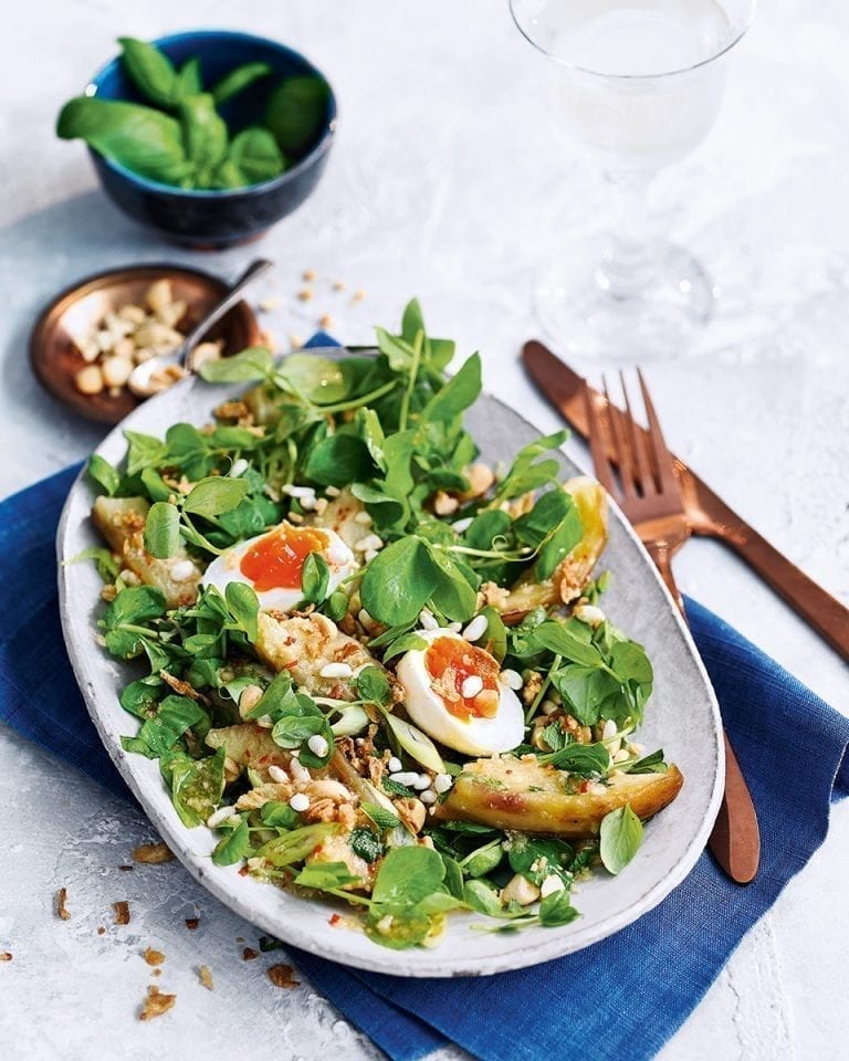 Spicy aubergine salad with peanuts, herbs and egg