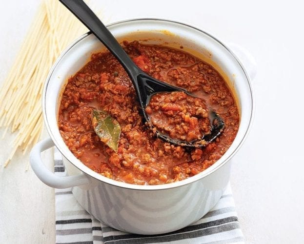 Bolognese sauce in a white pan