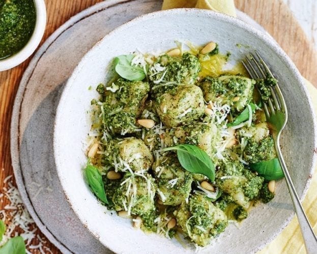 Salmon with gnocchi, peas and broad beans