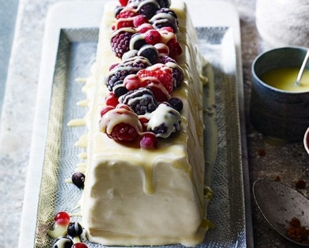 Semifreddo with iced berries and hot white chocolate sauce