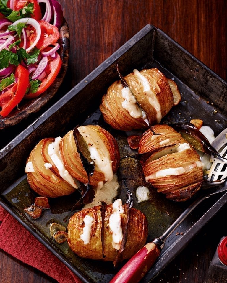 Bay and garlic studded hasselbacks with taleggio