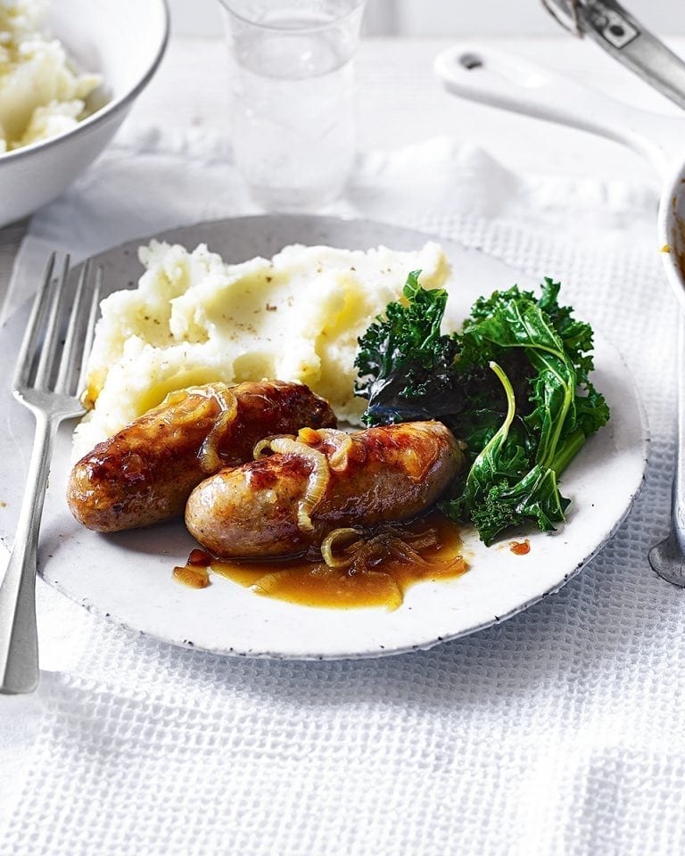 Bangers with tangy onion gravy and mash recipe delicious. magazine