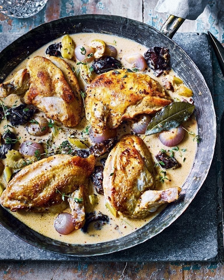 Pan-fried chicken supremes in mustard, cream and prune sauce