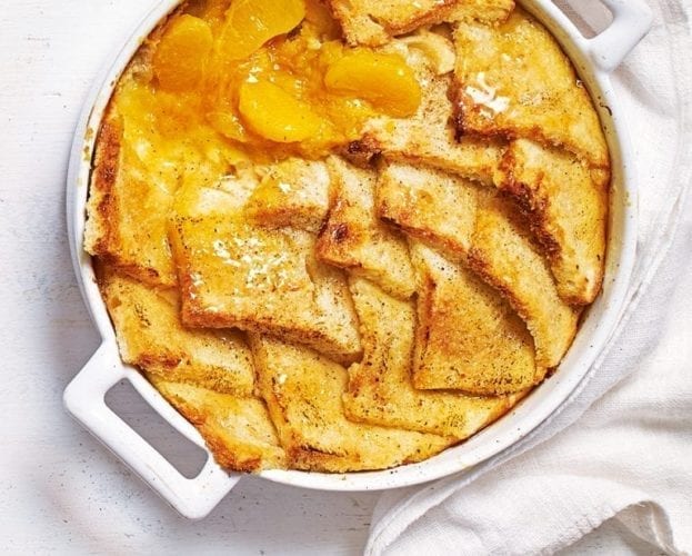Bread and butter pudding with clementine and honey compote