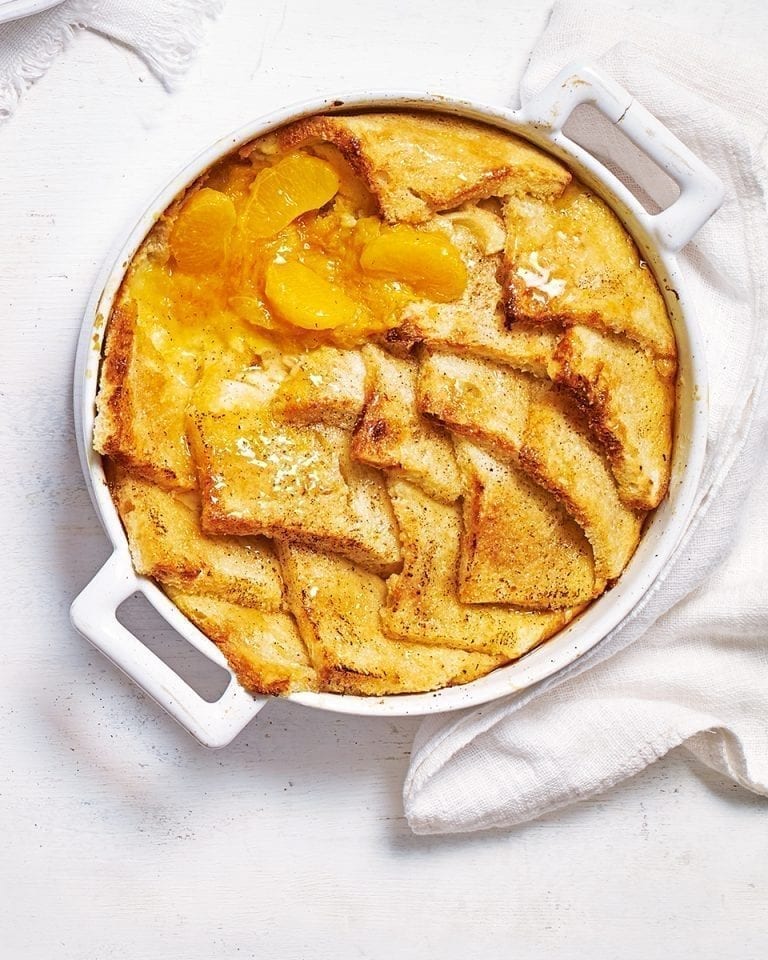 Bread and butter pudding with clementine and honey compote