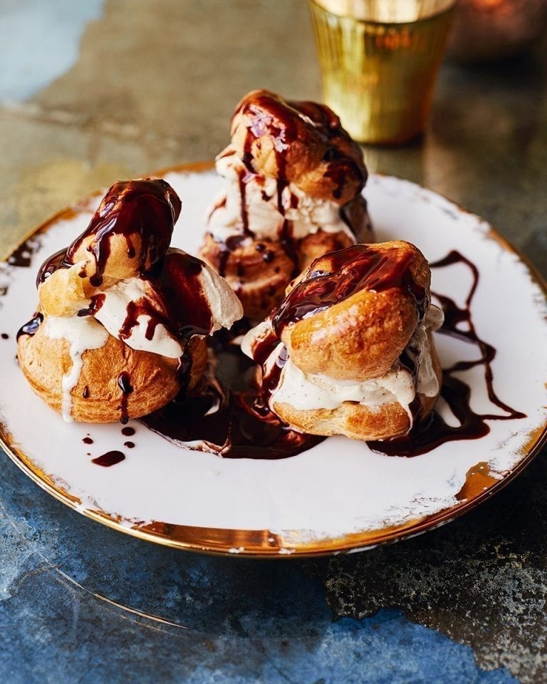 Ice cream profiterole sandwiches with salted chocolate sauce