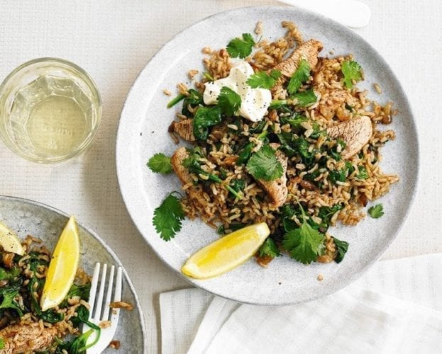 Spiced turkey rice on a white plate