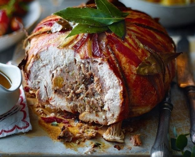 Whole roast goose stuffed with apples and prunes