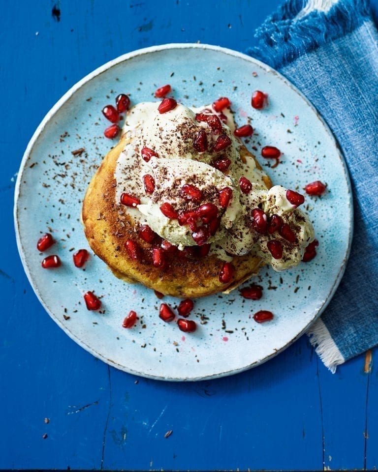 Pancake waffles with ice cream and pomegranate