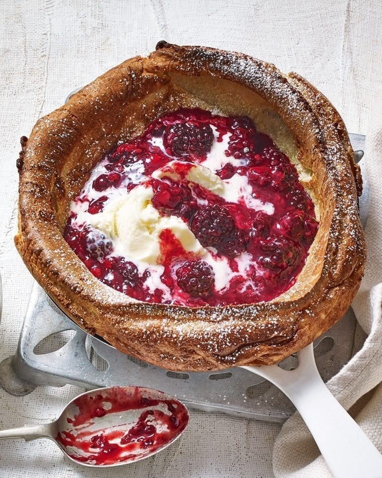 Dutch baby with fruity compote and ice cream