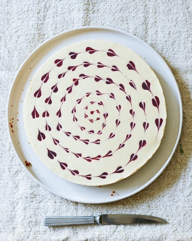Lingonberry and orange cheesecake with a gingersnap crust