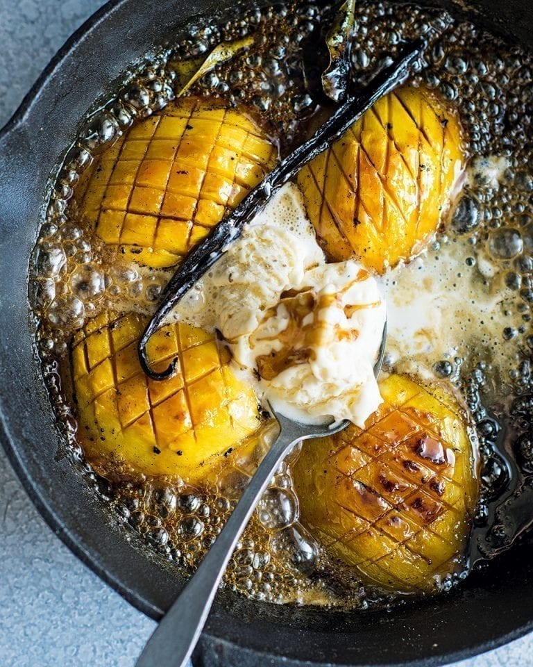 Mango baked in coconut sugar and kaffir lime with coconut ice cream