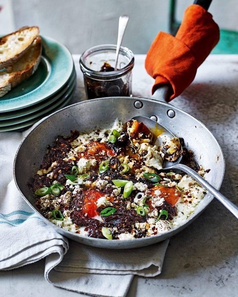 Fried eggs with feta and spiced onion jam recipe | delicious. magazine