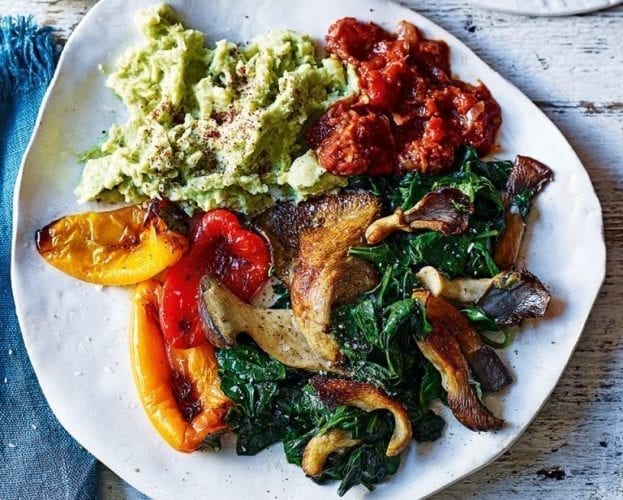 Vegan ‘scrambled eggs’ with mushrooms and greens