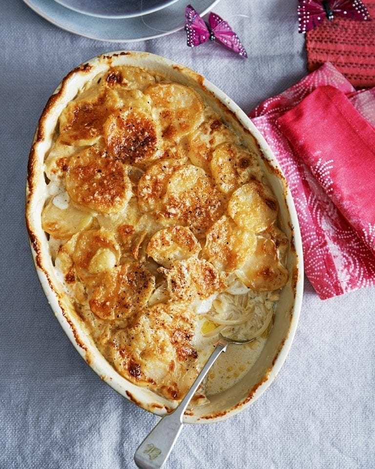 Slivered potatoes with white onion and Lancashire cheese