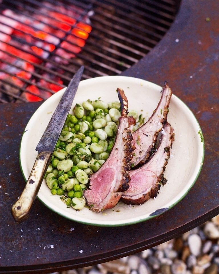 Barbecued rack of mutton with broad beans, peas and lovage