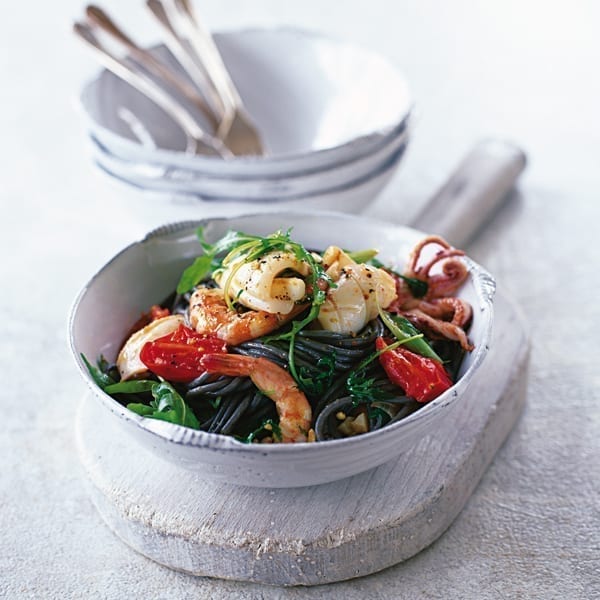 Garlic squid and prawns with black linguine