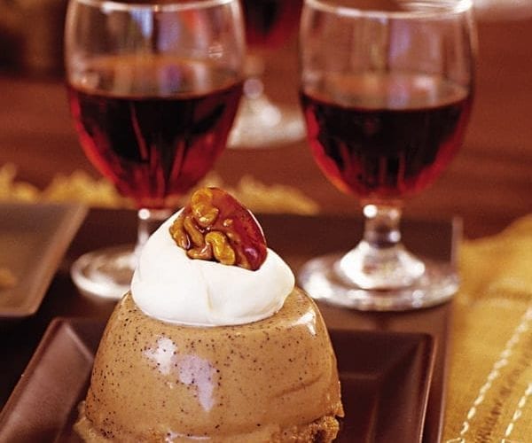 Coffee trifles shown with walnuts on top