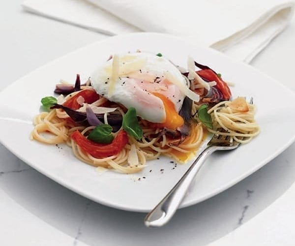 Roasted onion and tomato spaghetti with poached egg
